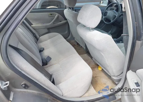 2001 Toyota Camry Le from USA, damaged, VIN 4T1BG22K61U034576